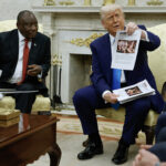 Trump exhibits South African president video of memorial to useless